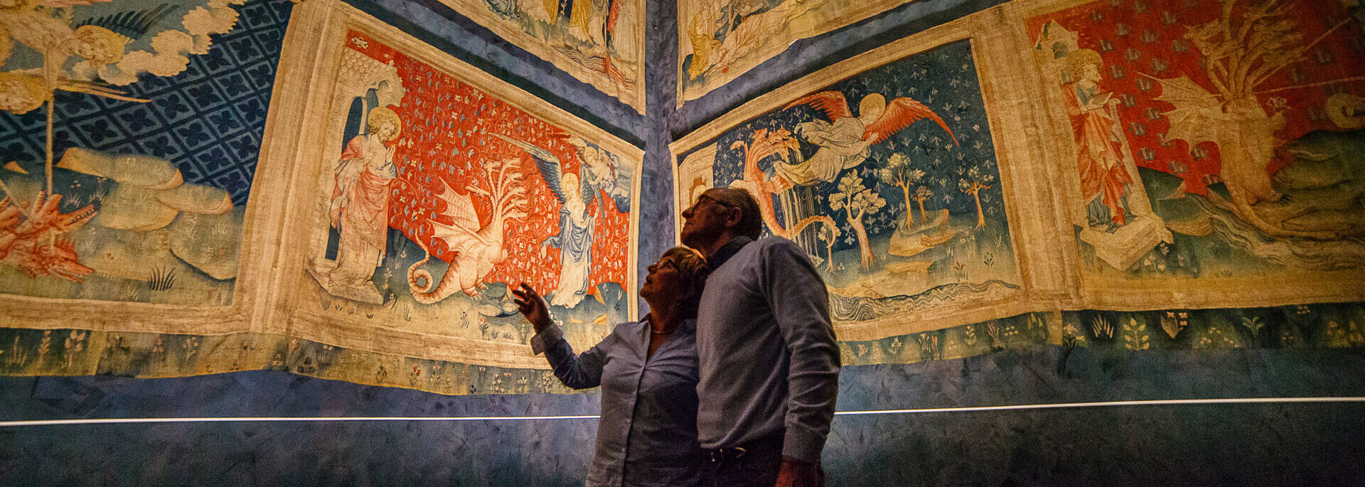 Couple looking at the Tapestry of the Apocalypse, at Château d'Angers