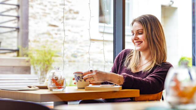 Young women at a table in a tea room